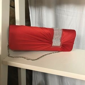 ! Red material clutch with “diamonds”